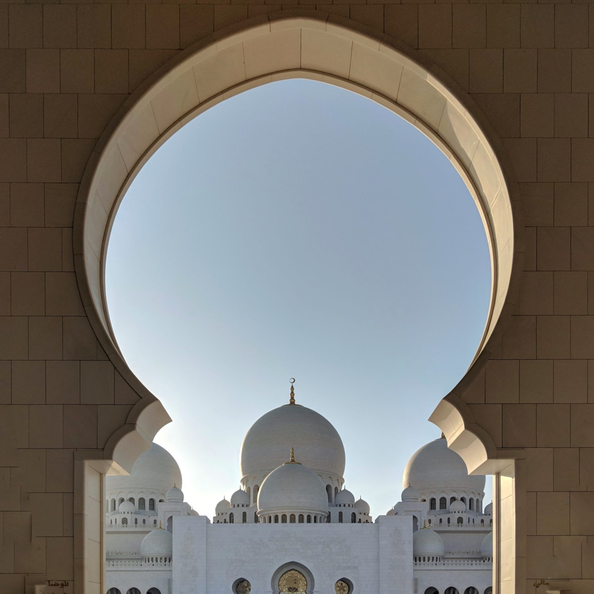 White marble domes of the Sheikh Zayed Grand Mosque in Abu Dhabi